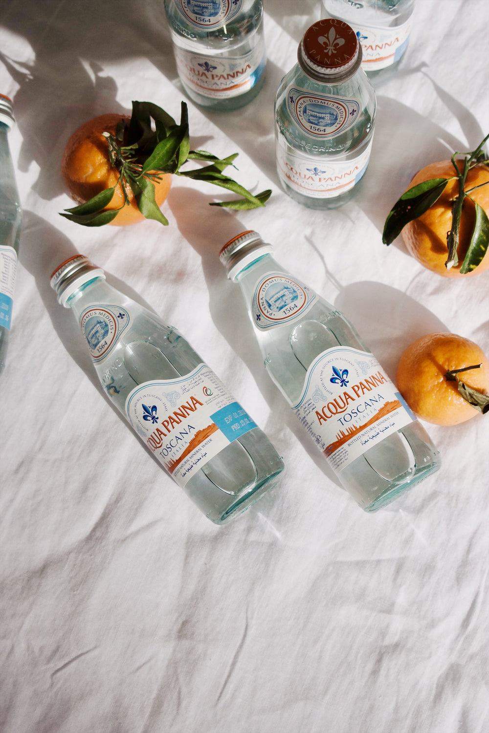 Plastic Bottle Of Drink Water And Reflection On Table With